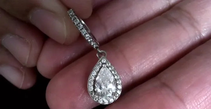 Pear-cut earrings shown in a Luxe livestream