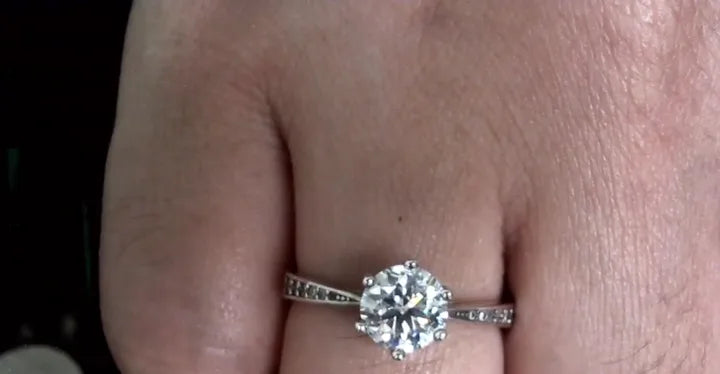Side-stone ring shown in a Luxe livestream